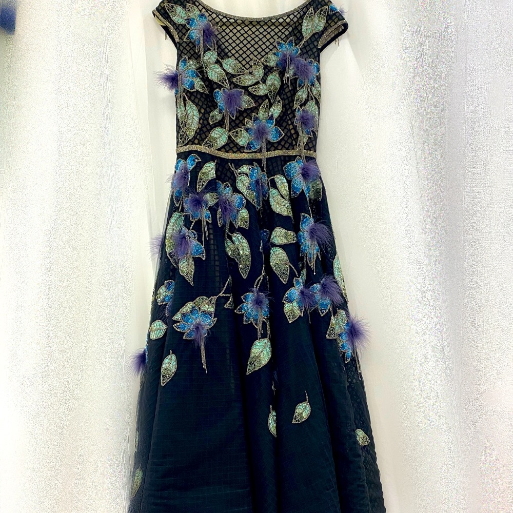 Marchesa gown. Black with blues, green and purples. Pewter beads. Hand beaded.